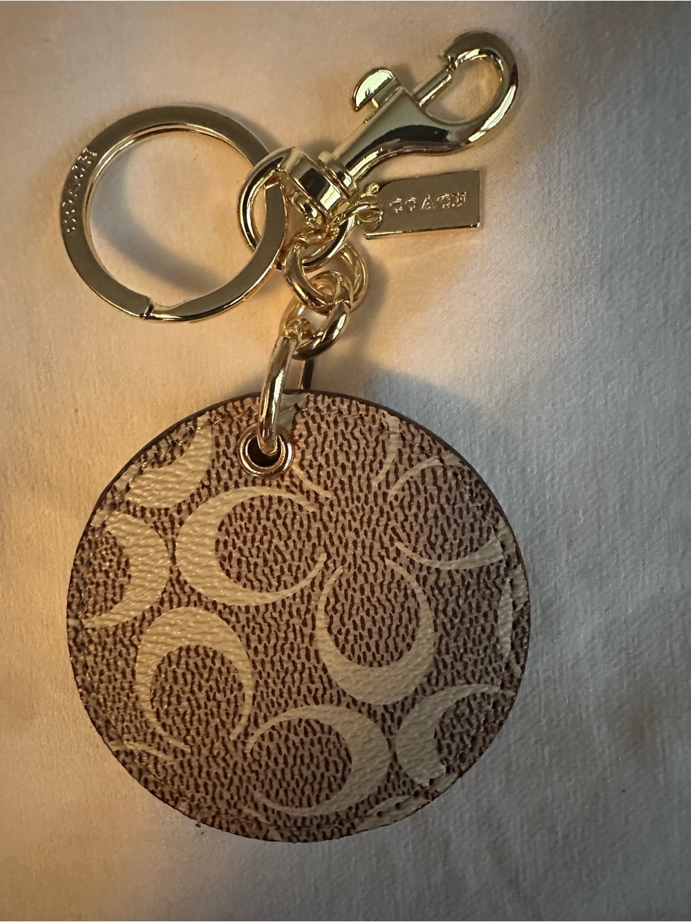 Coach Beige/Brown Signature Round Key Ring with Gold Hardware and mirror